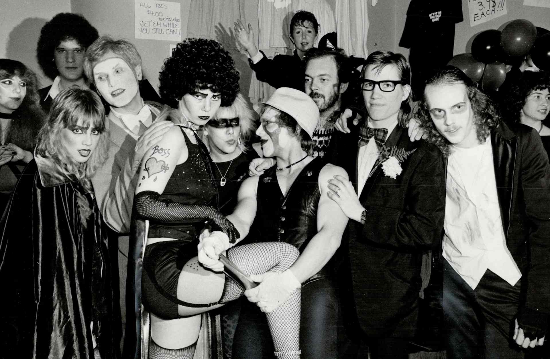 Some of the 700 'Rocky Horror Picture Show' fans who lined up in the rain two hours before the final midnight screening of the cult movie that was a favorite at Toronto's Roxy Cinema for seven years.