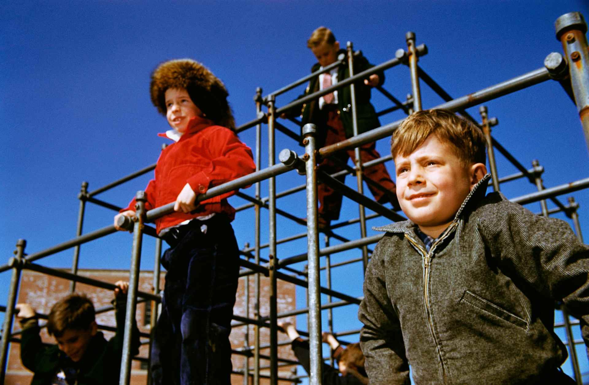 Boys Playing on Jungle Gym