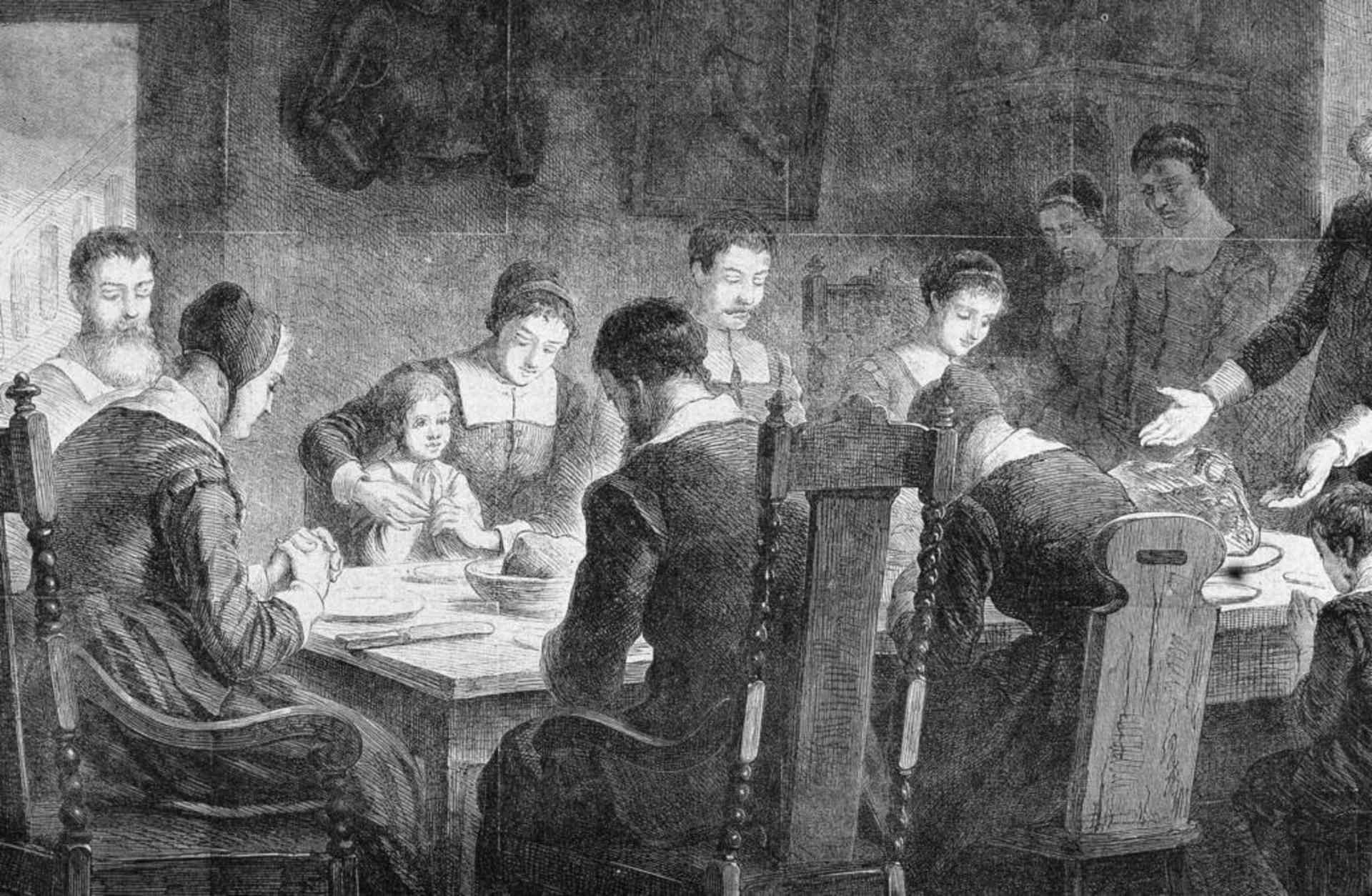 A man leading a blessing for Thanksgiving dinner, from an 1867 illustration. (Credit: Kean Collection/Getty Images)