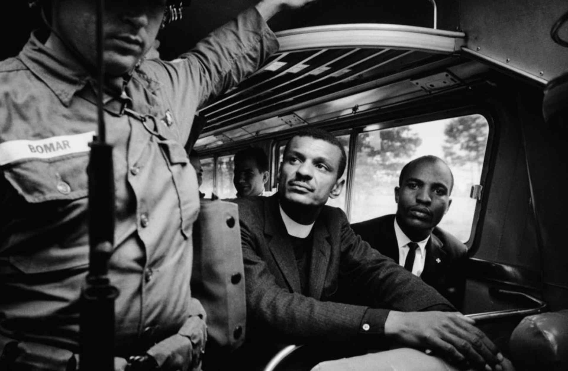 A National Guardsmen on a bus with two Freedom Riders, May 1961. (Credit: Paul Schutzer/The LIFE Picture Collection/Getty Images)