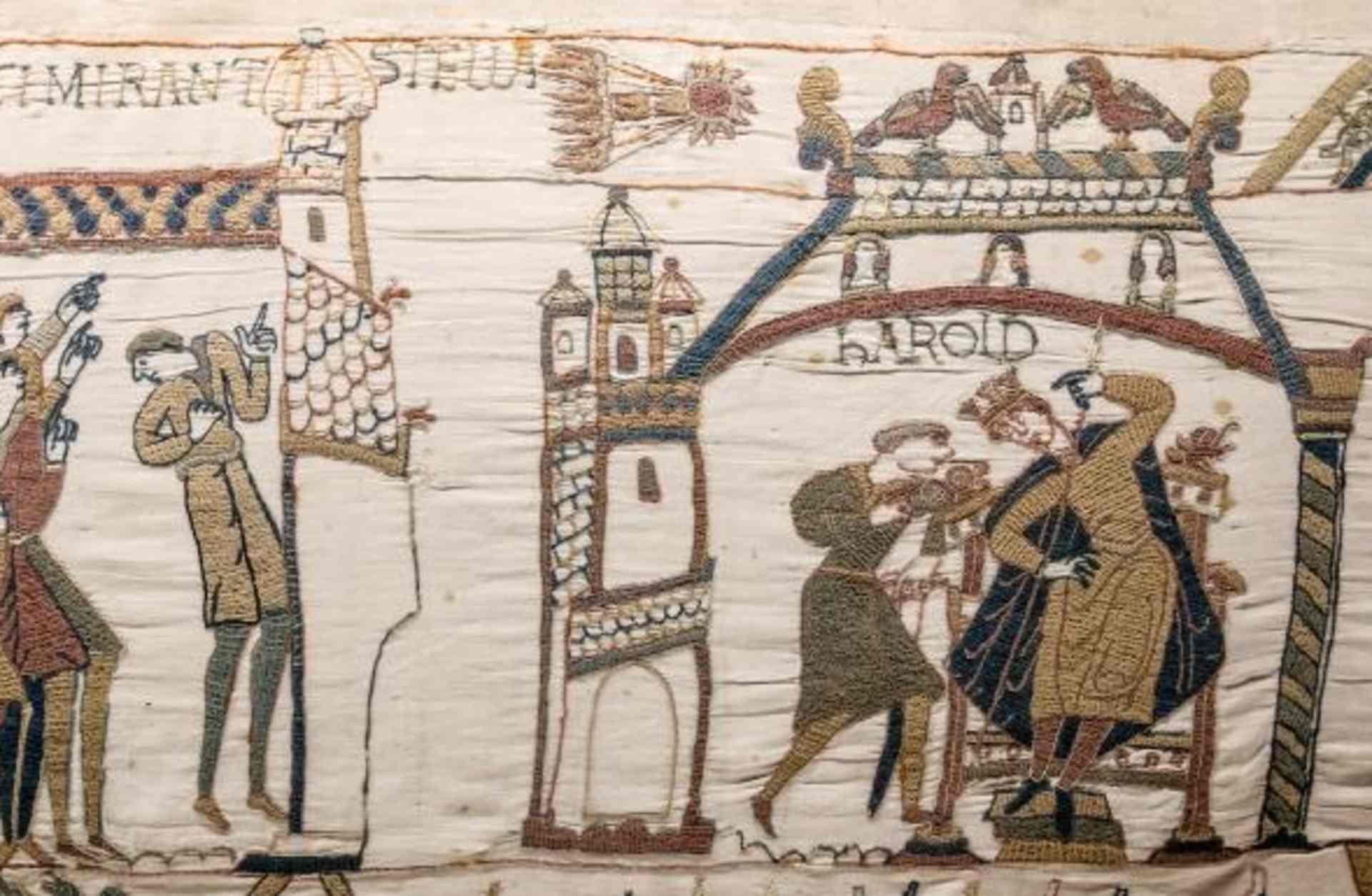 A scene from the Bayeux Tapestry, with Halley's Comet at the center.