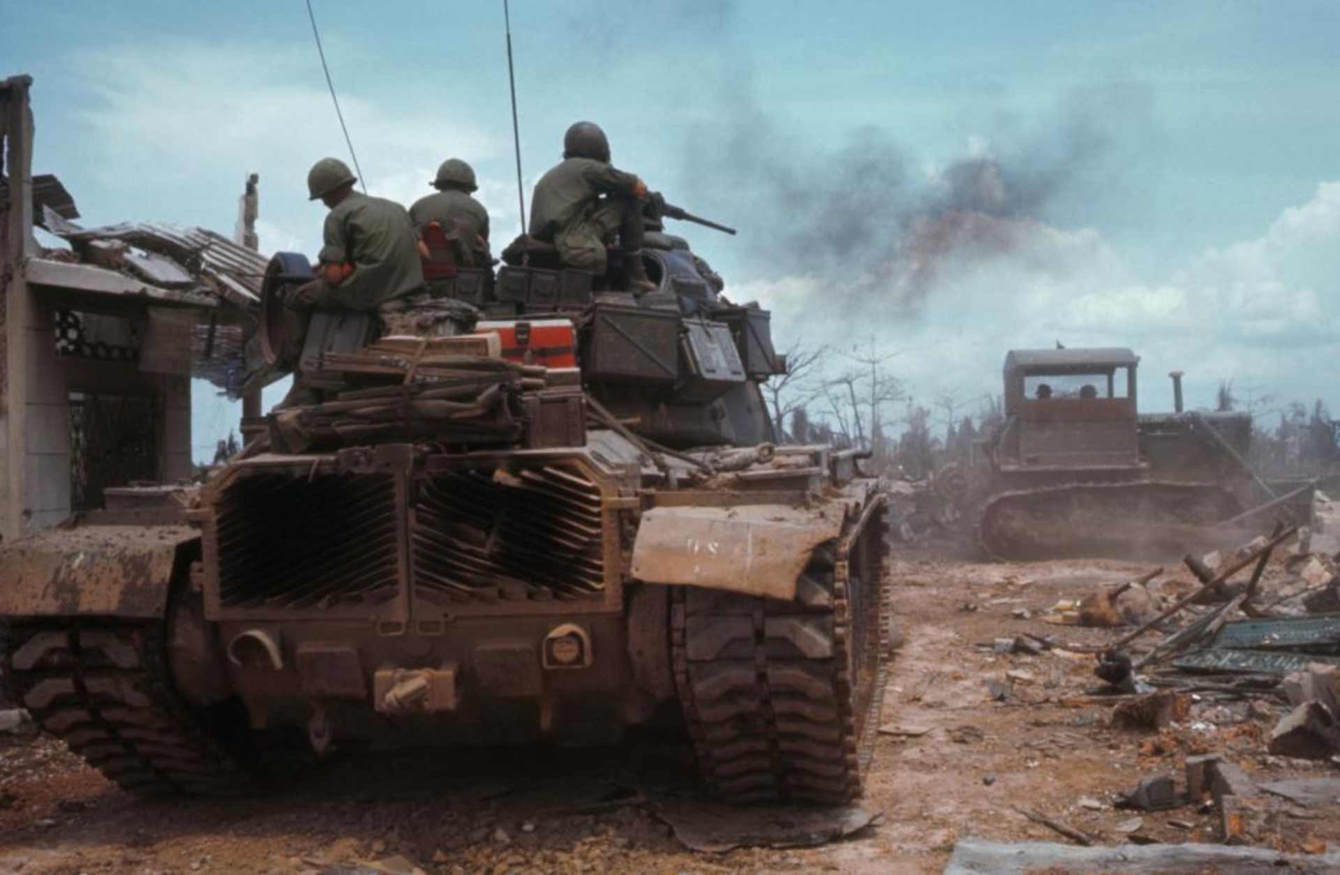 An American tank of the 9th Division among the ruins of a Saigon street after the Mini-Tet offensive in 1968