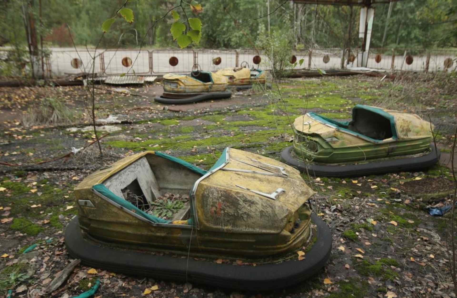Bumper cars stand in an abandoned amusement park in Prypiat, Ukraine, only a few kilometers from the former Chernobyl nuclear power plant. The city lies in the inner exclusion zone around Chernobyl where hot spots of persistently high levels of radiation make the area uninhabitable for thousands of years to come. (Credit: Sean Gallup/Getty Images)