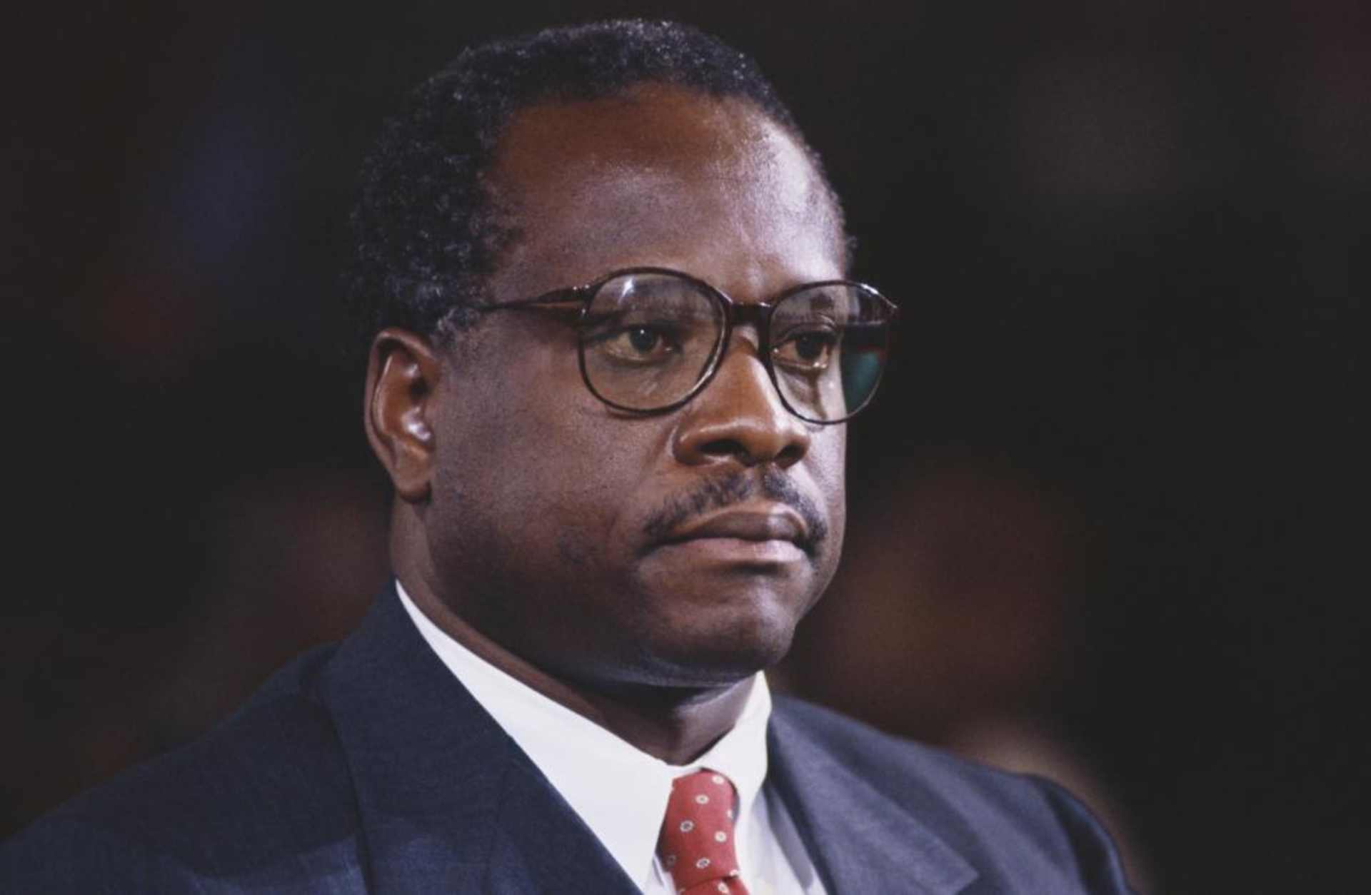 Clarence Thomas awaits proceedings during his hearing regarding the alleged sexual harassment of Anita Hill. (Credit: Wally McNamee/Corbis/Getty Images)