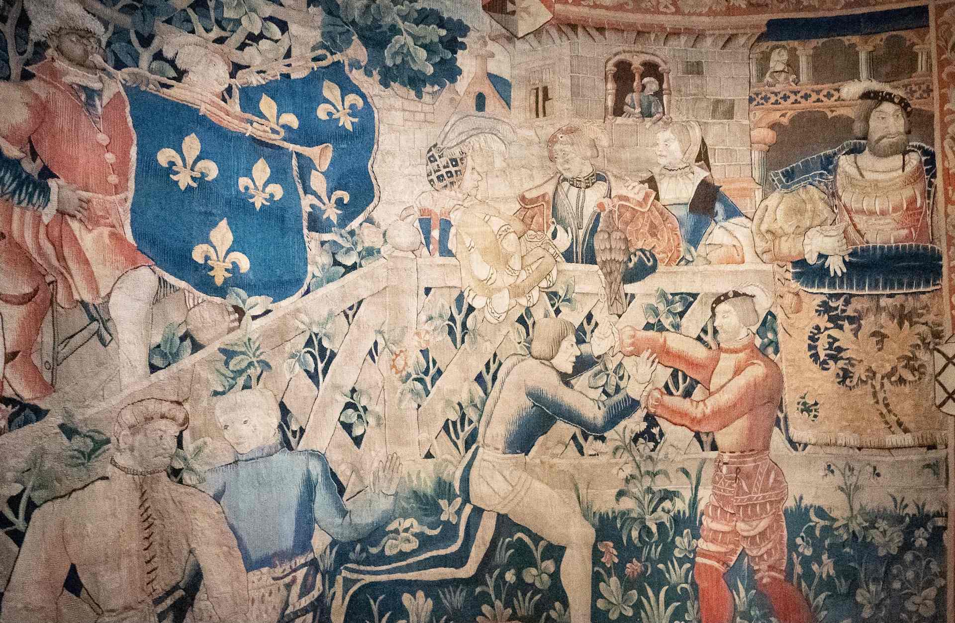 Detail of a tapestry showing wrestling at the Field of Cloth of Gold 1520, on display at Hampton Court Palace in London, May 17, 2021.