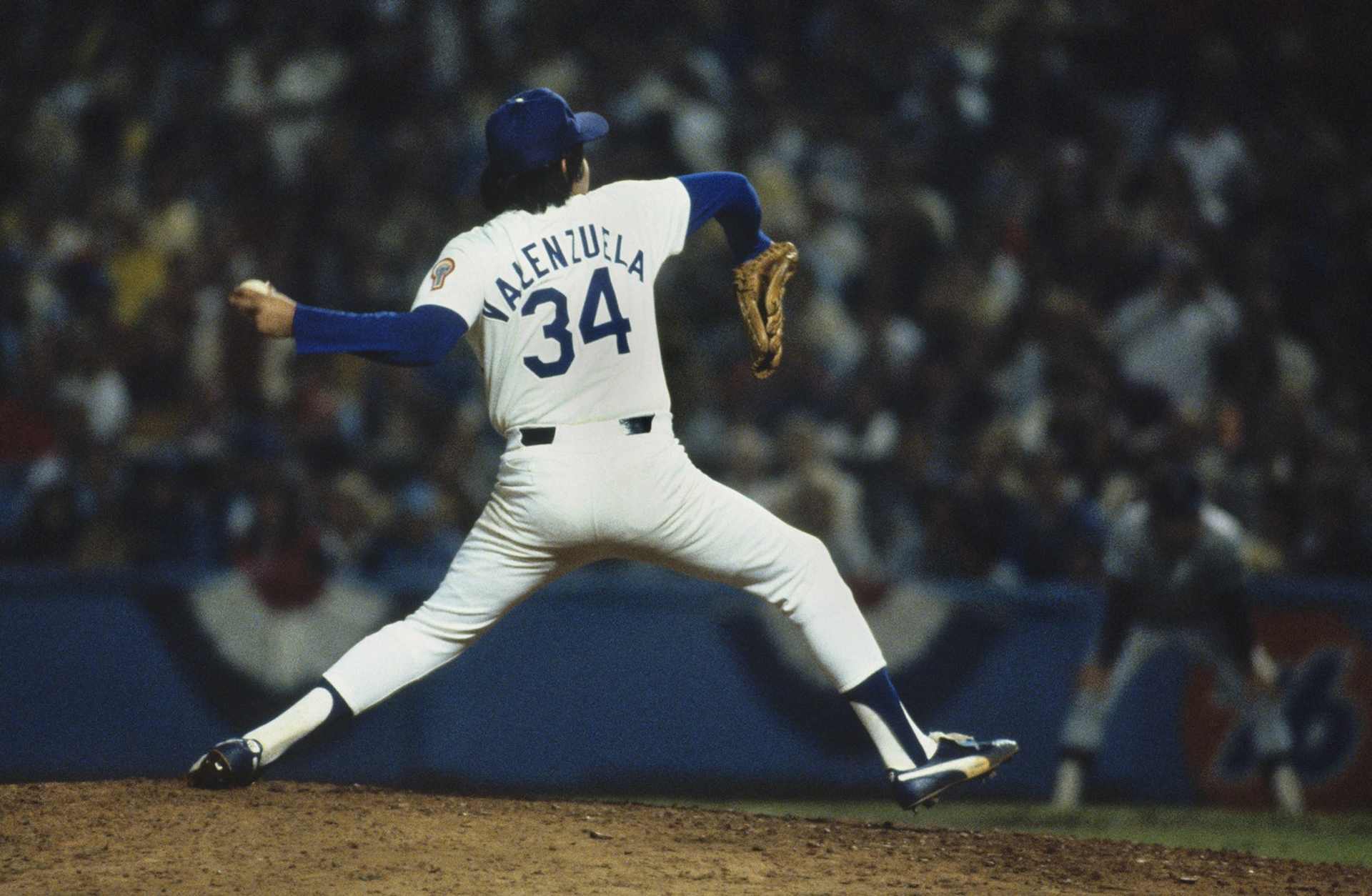 Pitcher Fernando Valenzuela #34 of the Los Angeles Dodgers pitches against the New York Yankees during Game 3 of the 1981 World Series at Dodger Stadium on October 23, 1981 in Los Angeles, California. The Dodgers defeated the Yankees 5-4. (Photo by Focus on Sport via Getty Images)