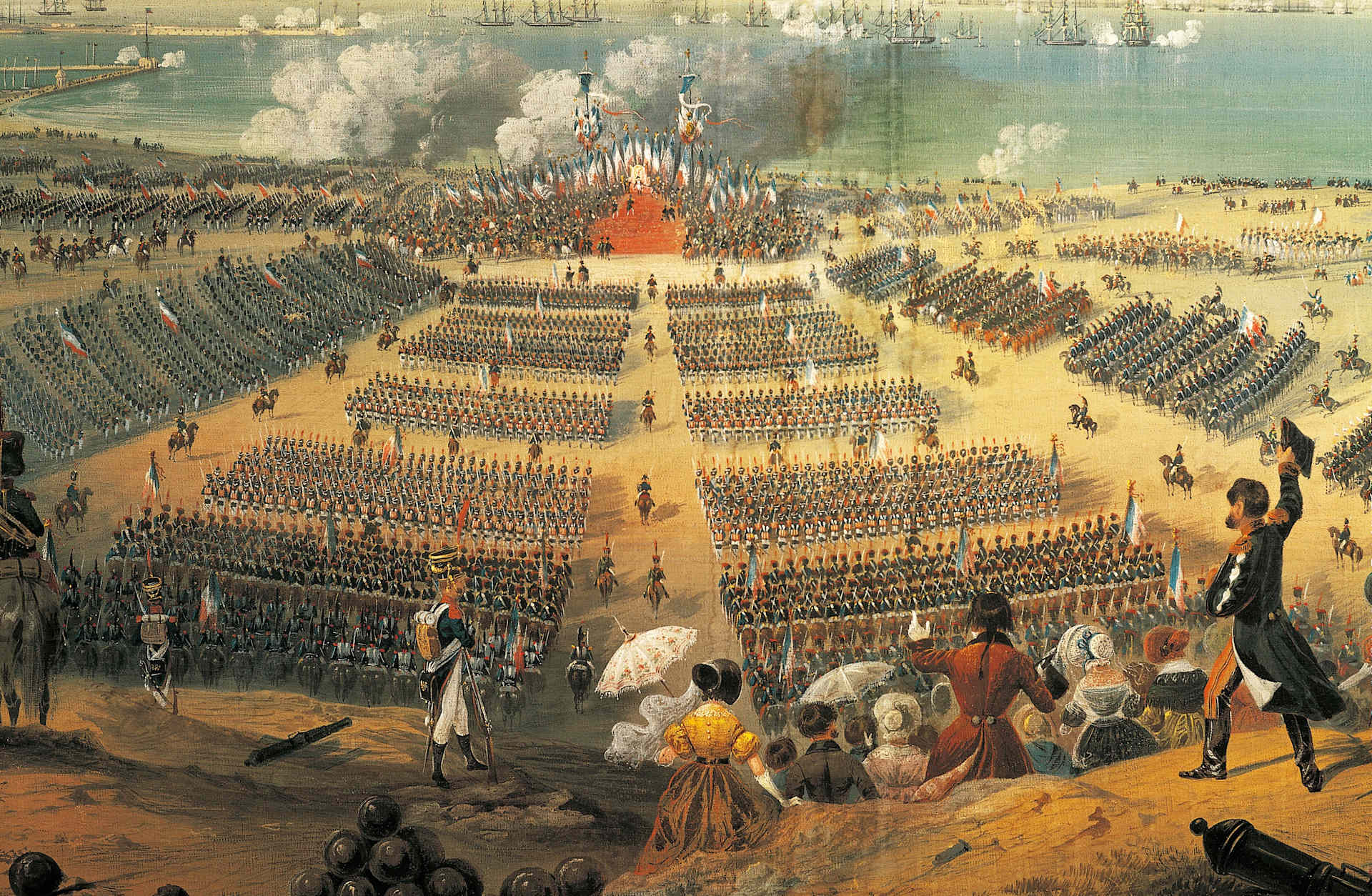 A colorful painting of huge groups of French troops arrayed in a large semicircle around a throne held by Napoleon.