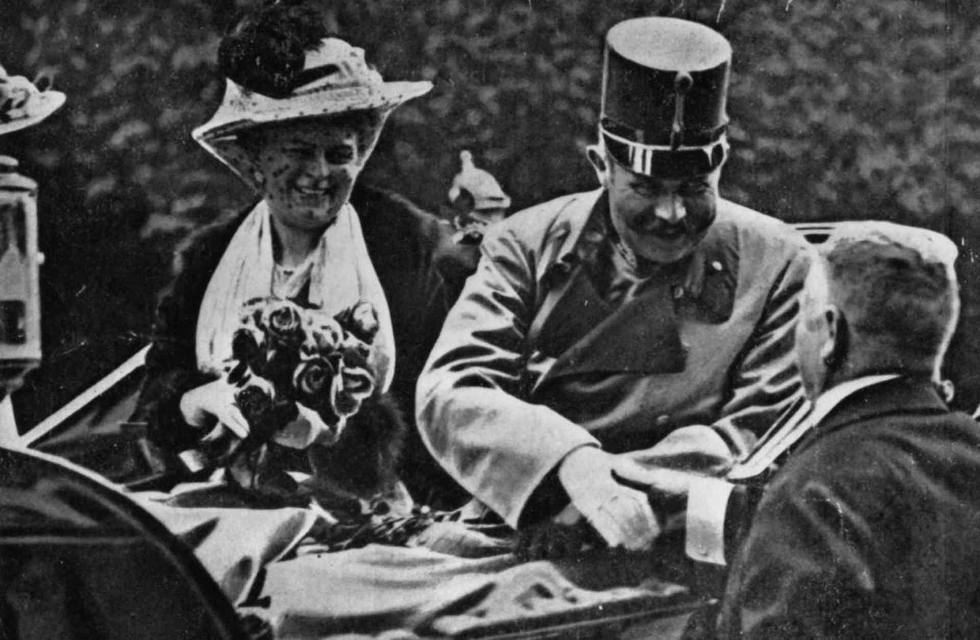 Franz Ferdinand, archduke of Austria, and his wife Sophie riding in an open carriage at Sarajevo shortly before their assassination. (Credit: Henry Guttmann/Getty Images)