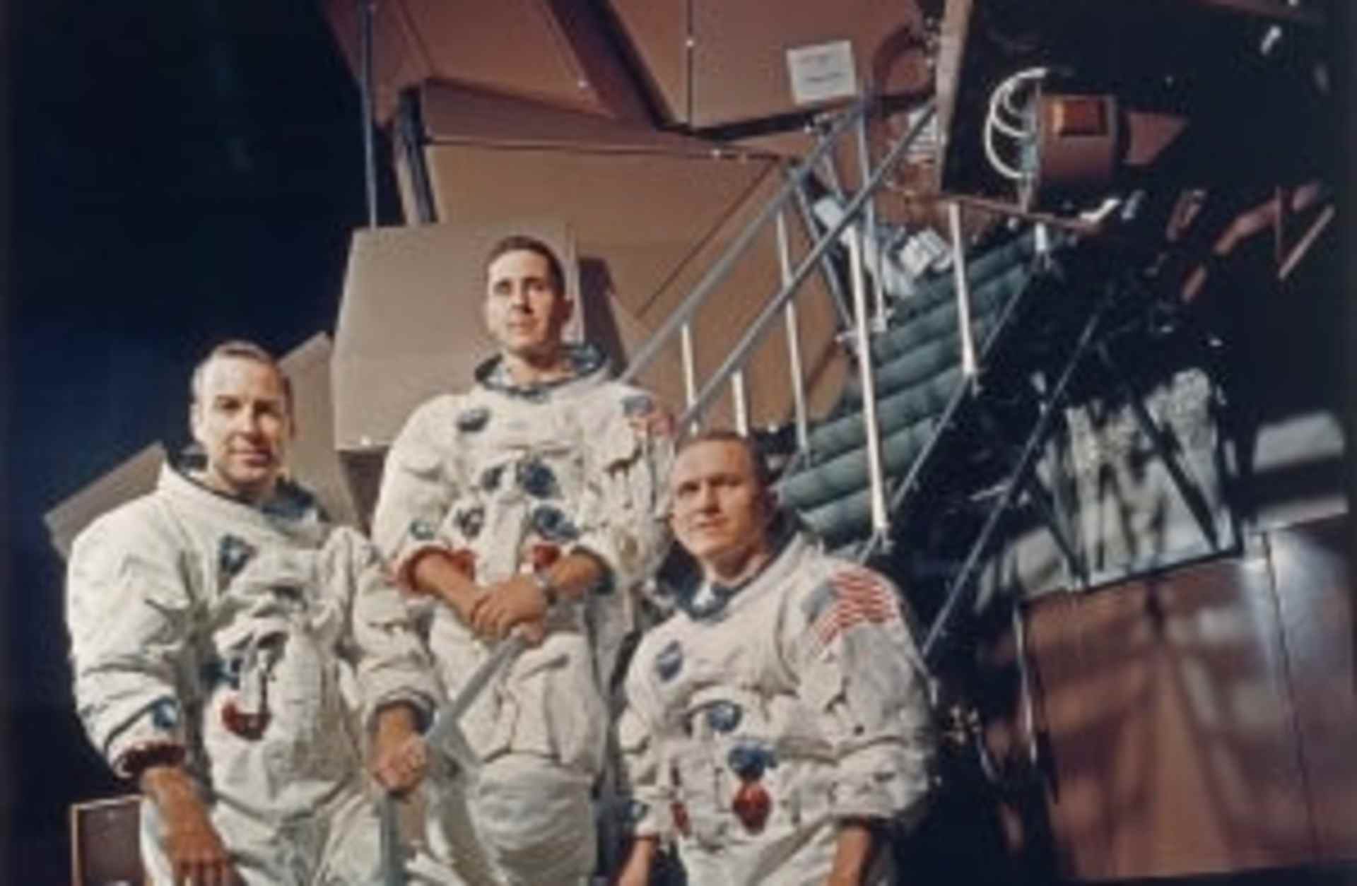 The crew of Apollo 8 in their space suits on a Kennedy Space Center simulator. Left to right: James A. Lovell Jr., William A. Anders and Frank Borman.