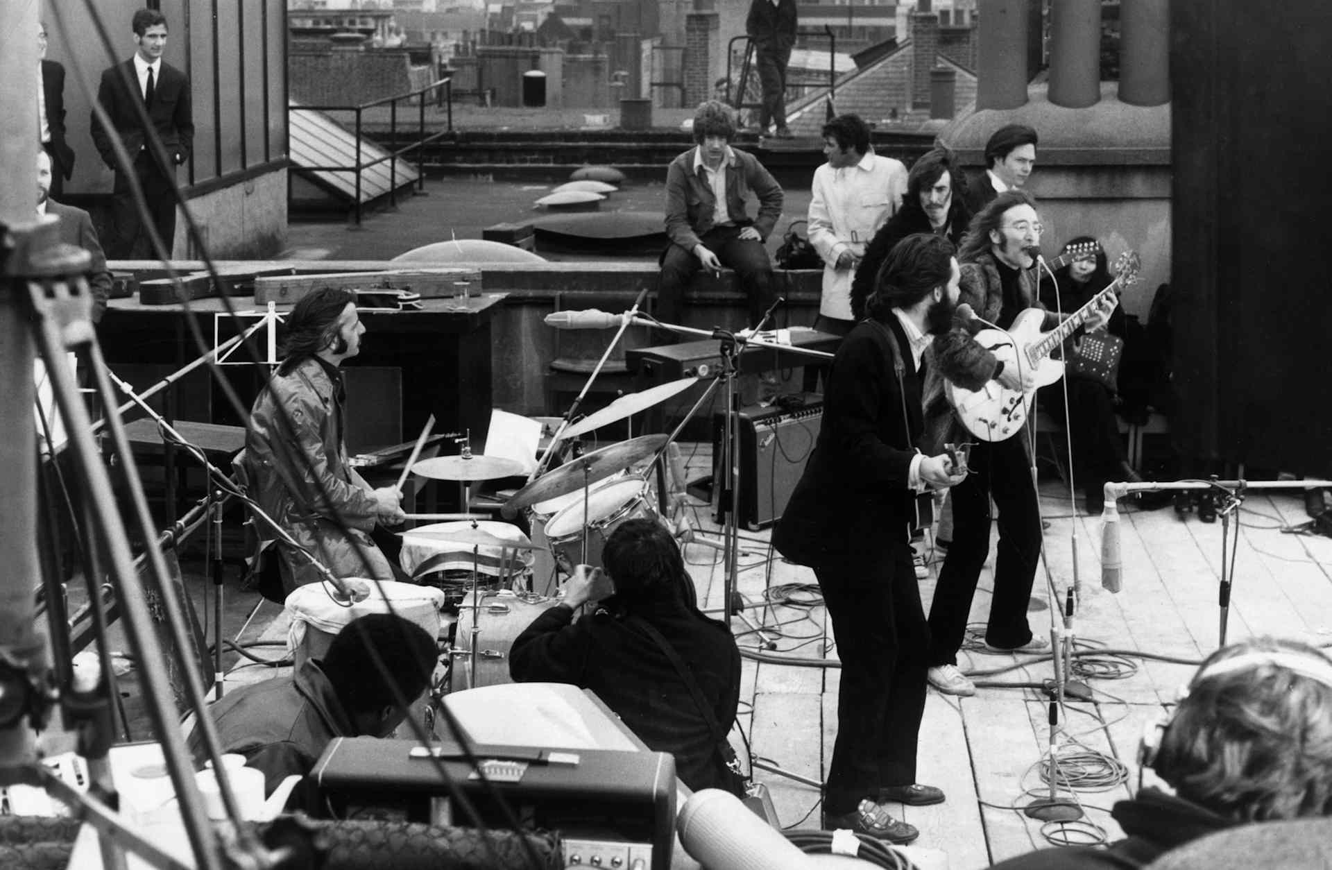 The Beatles performing their last live public concert on the rooftop of the Apple Organization in London on January 30, 1969.