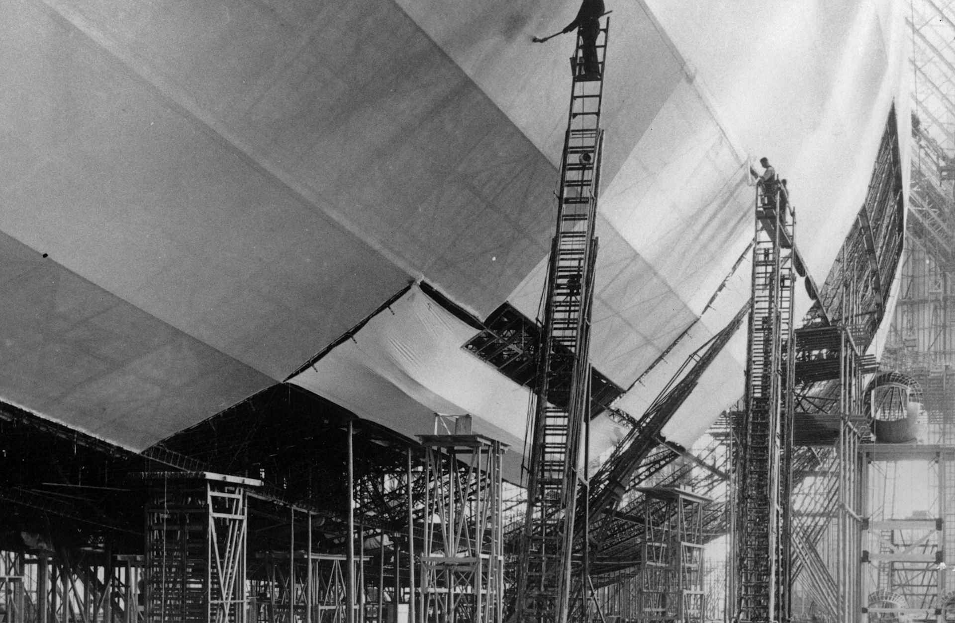1935: The airship Hindenburg (LZ-129), under construction at Friedrichshafen, was a proud aviation accomplishment for Nazi Germany.