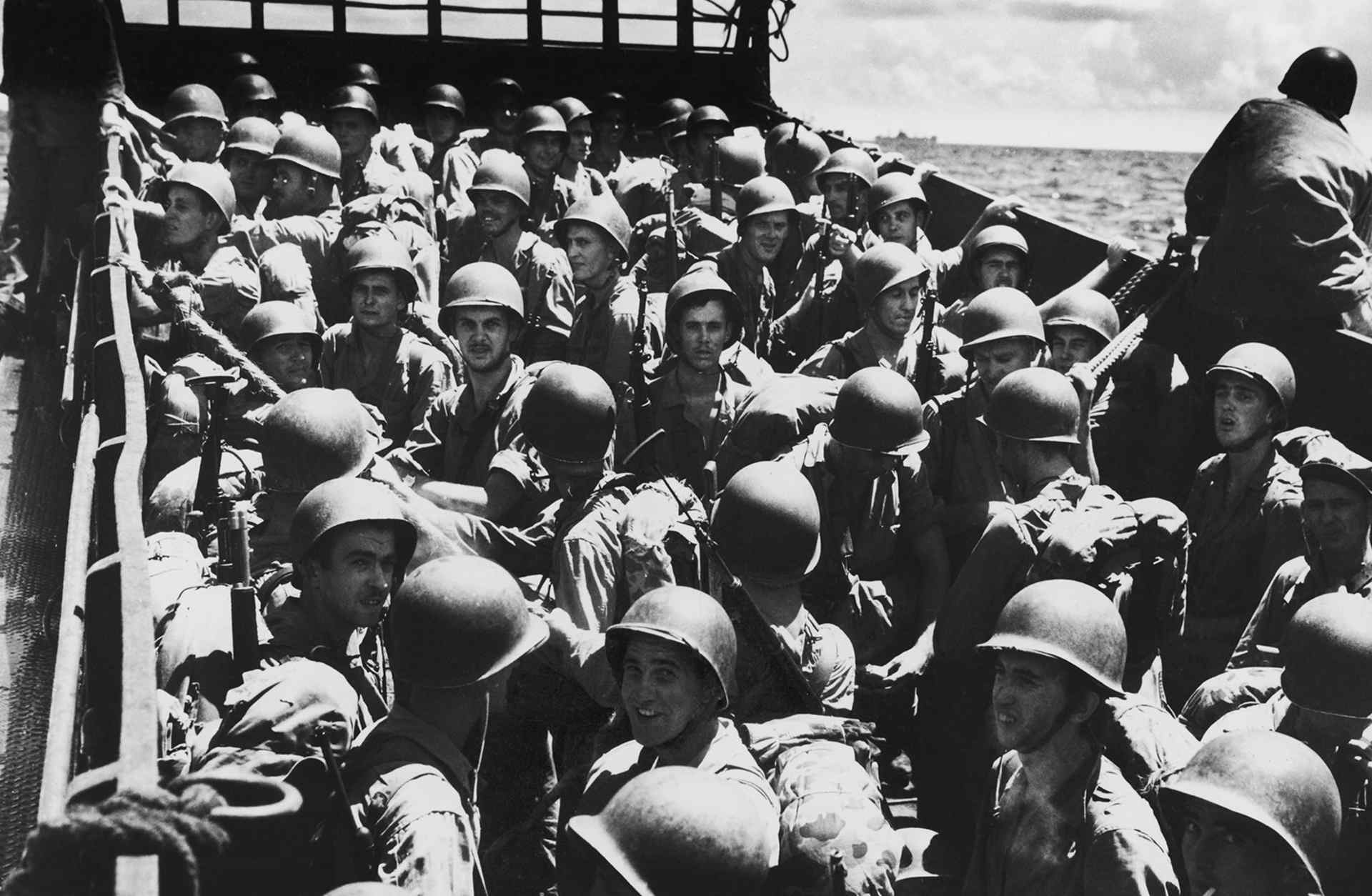 American servicemen on board a landing craft during the Battle of Guam, July - August 1944.