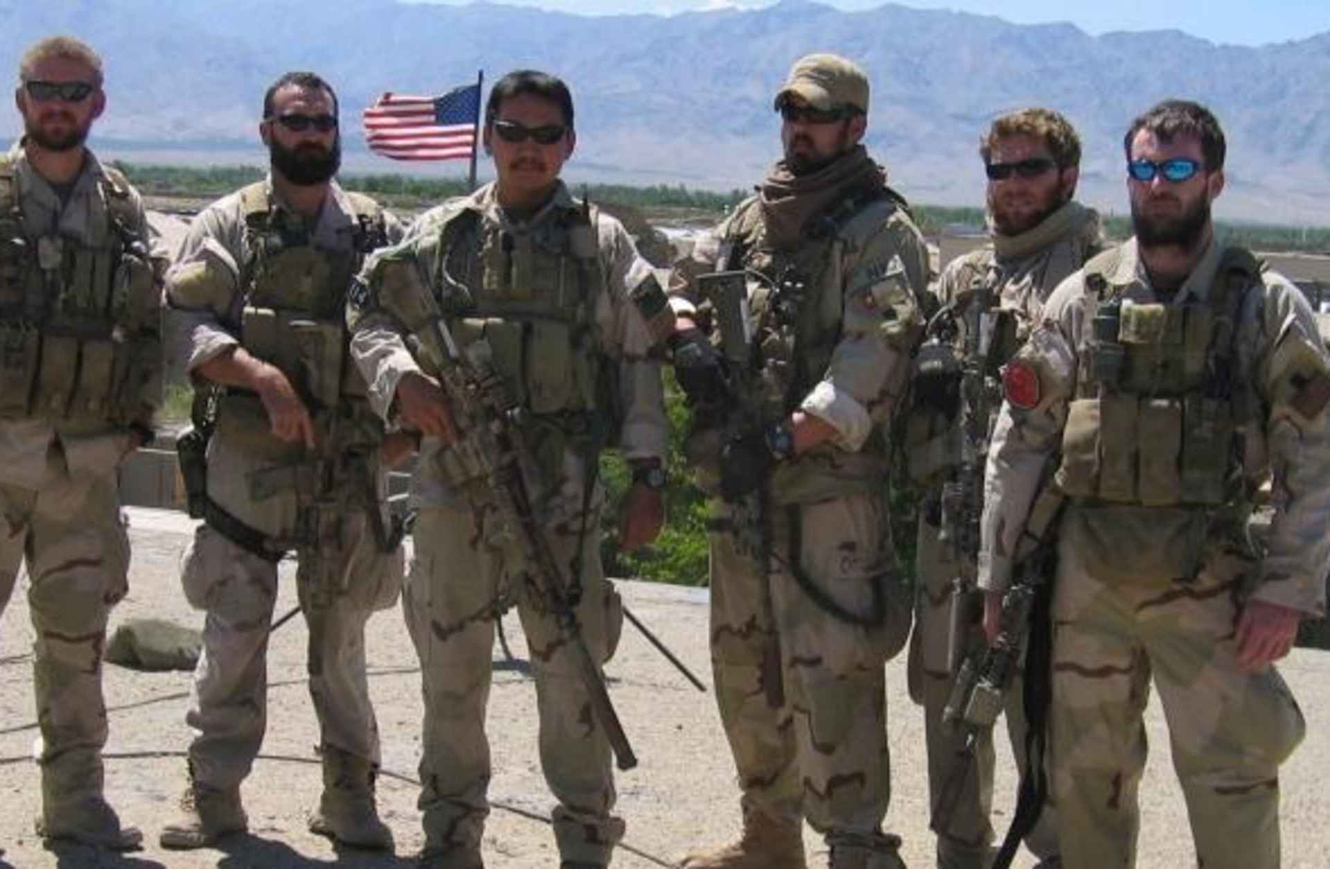 Matthew G. Axelson, Daniel R. Healy, James Suh, Marcus Luttrell, Eric S. Patton and Michael P. Murphy pose in Afghanistan on June 18, 2005. Ten days later, all but Luttrell would be killed by enemy forces while supporting Operating Red Wings, which also claimed the lives of Danny Dietz and 13 other Navy Seals.