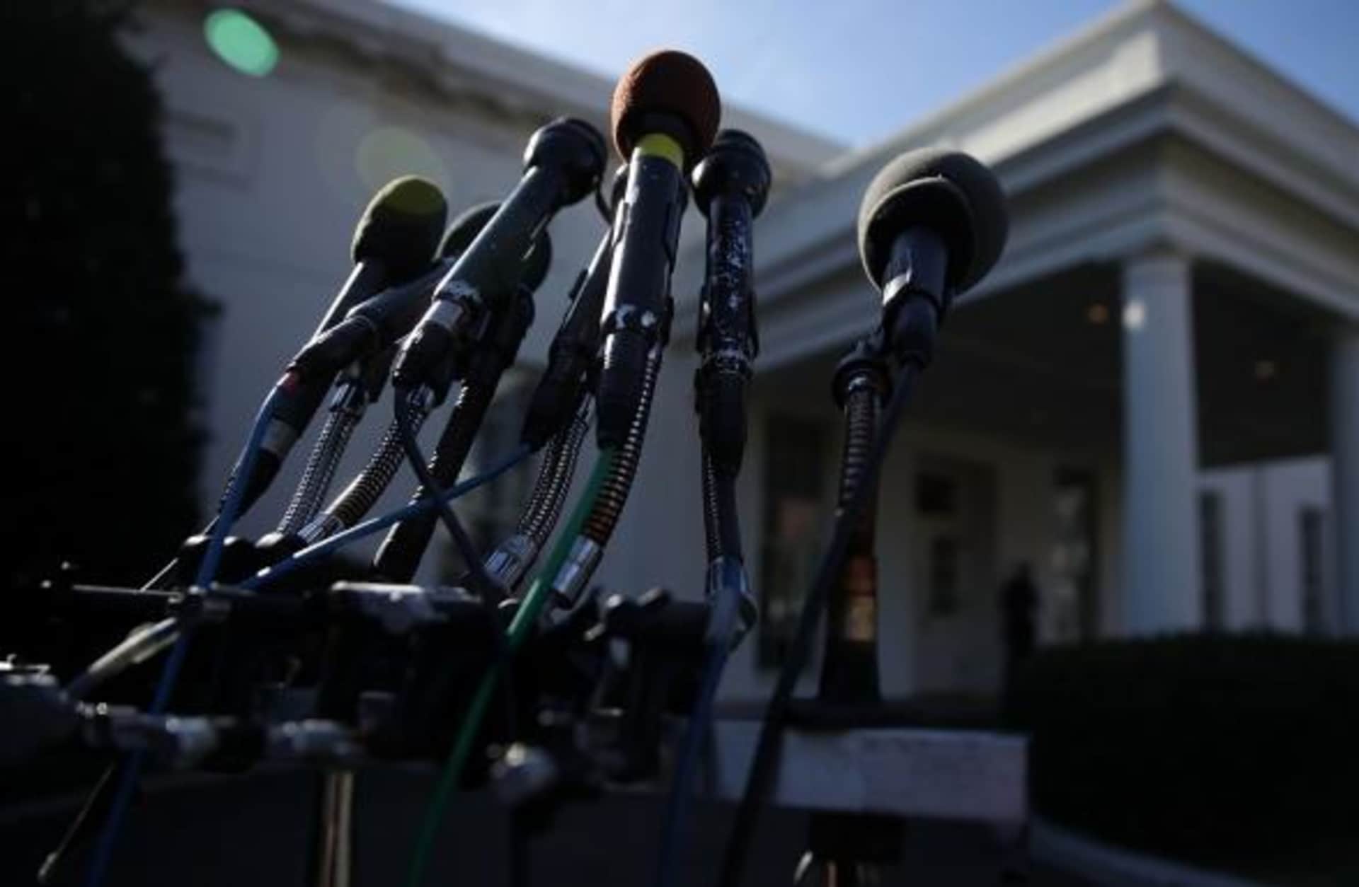 Microphones set up outside the White House.