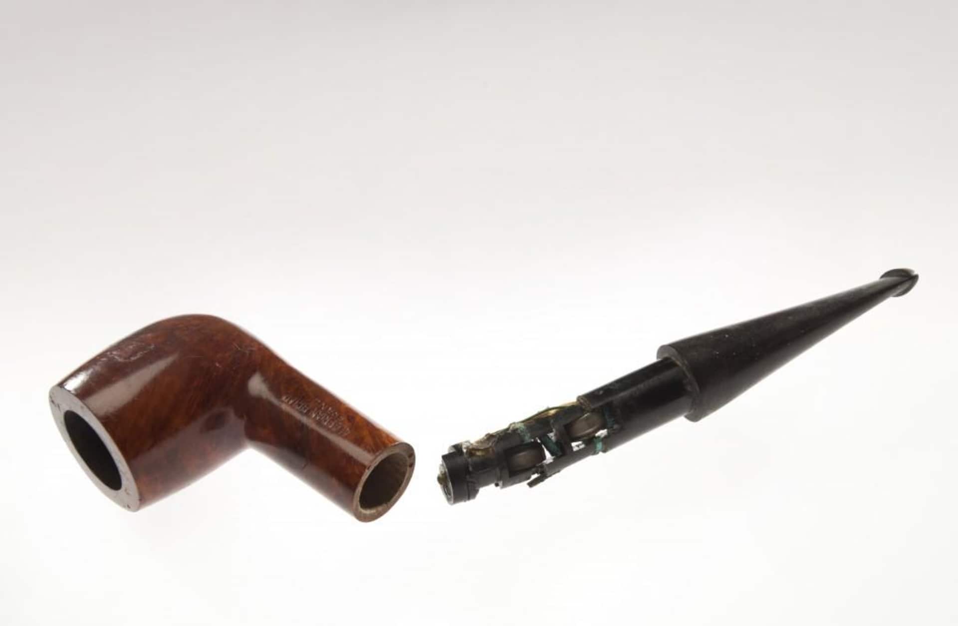 CIA pipe with radio receiver