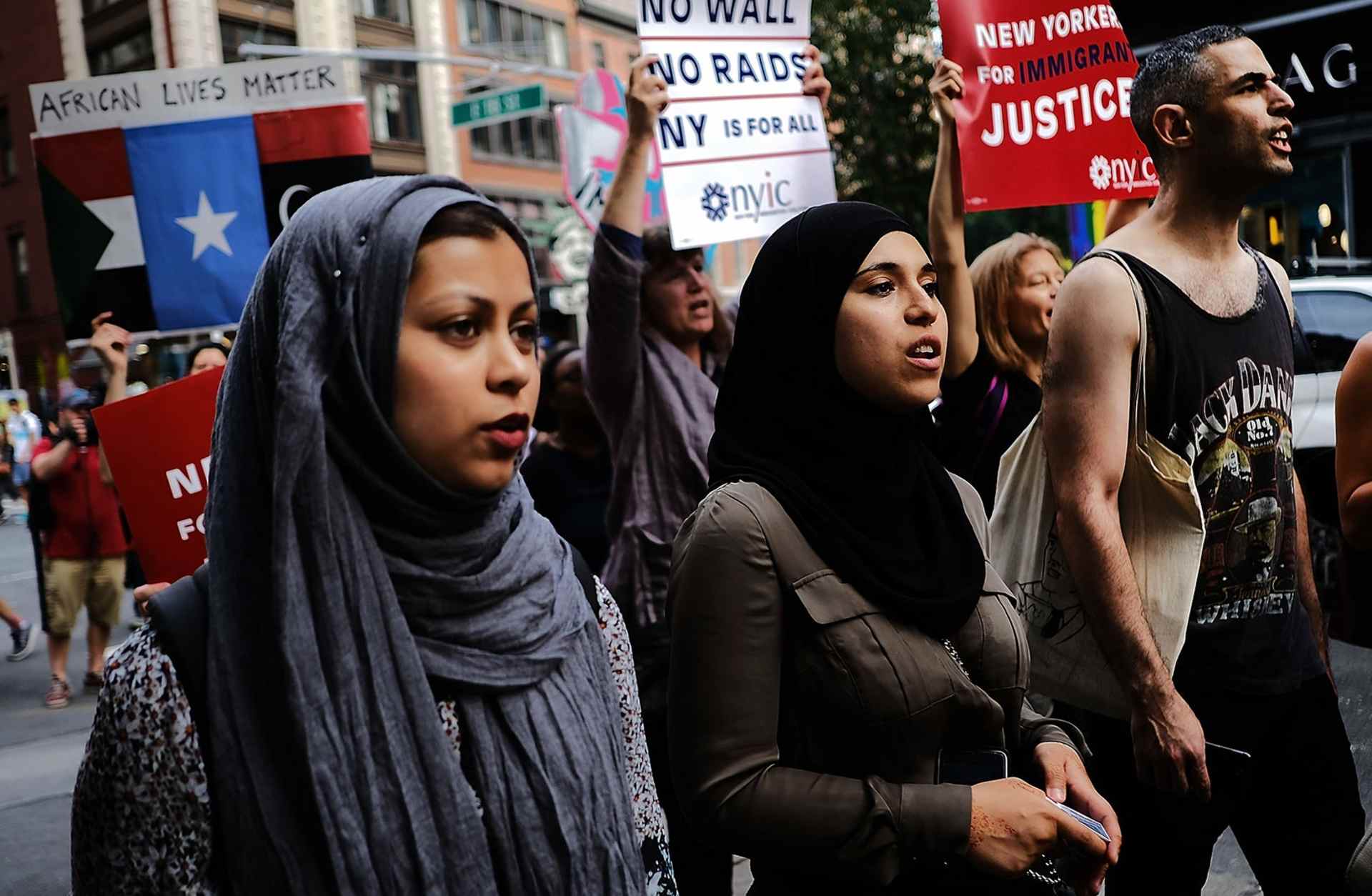 Recent immigrants join activists for an evening protest in Manhattan hours before a revised version of President Donald Trump's travel ban that was approved by the Supreme Court is to take effect on June 29, 2017 in New York City.