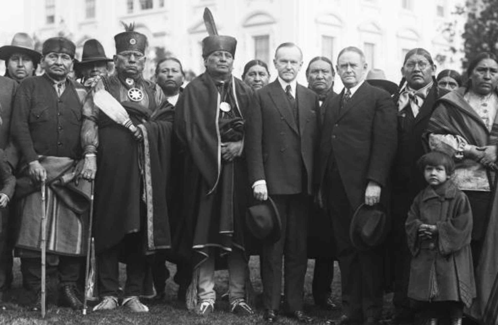 Osage Indians in Washington D.C., with President Coolidge. (Credit: Bettmann / Getty Images)