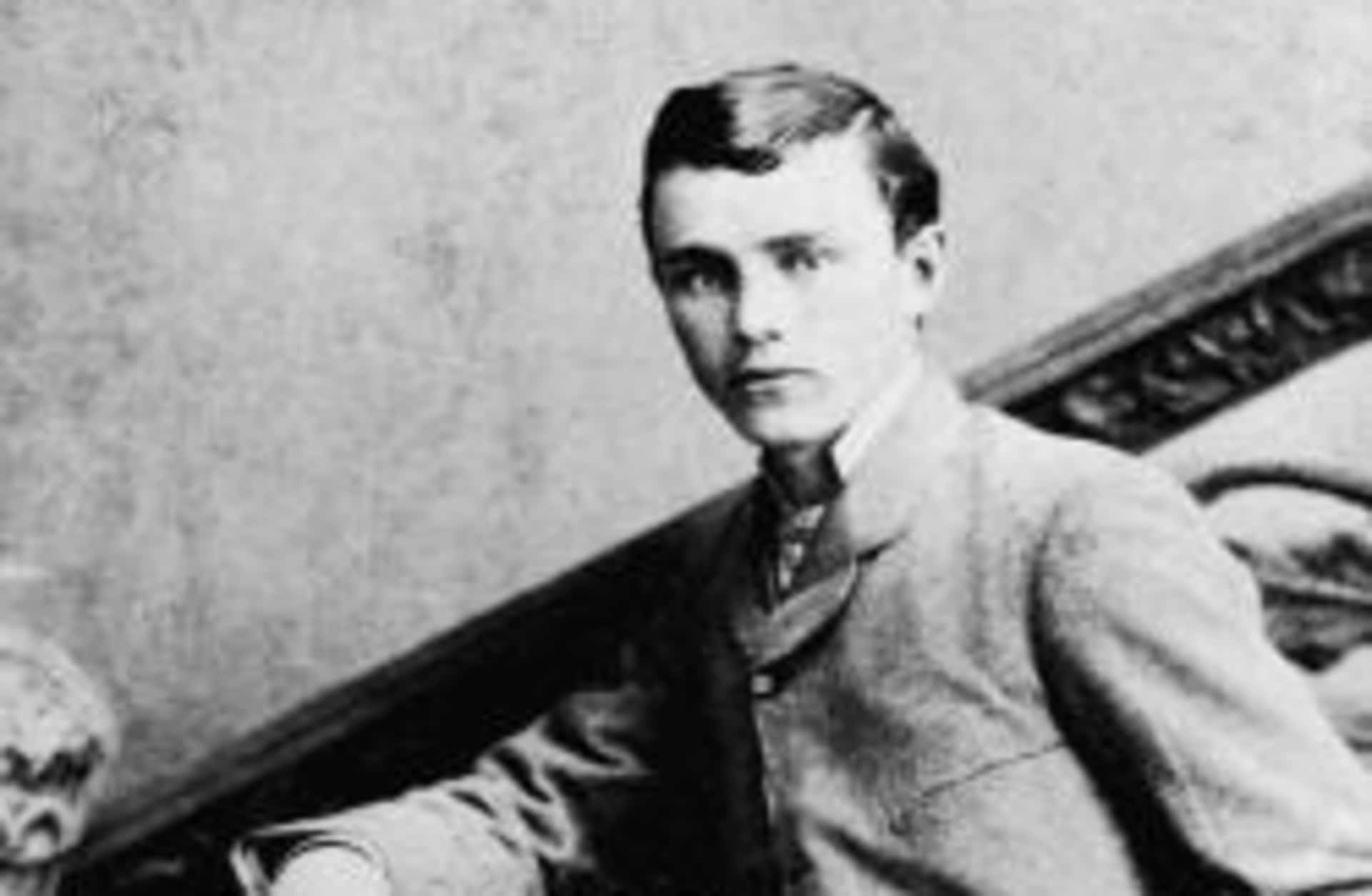 Portrait of American assassin Robert Ford showing off the revolver he used to kill outlaw Jesse James in 1882. (Credit: Authenticated News/Getty Images)