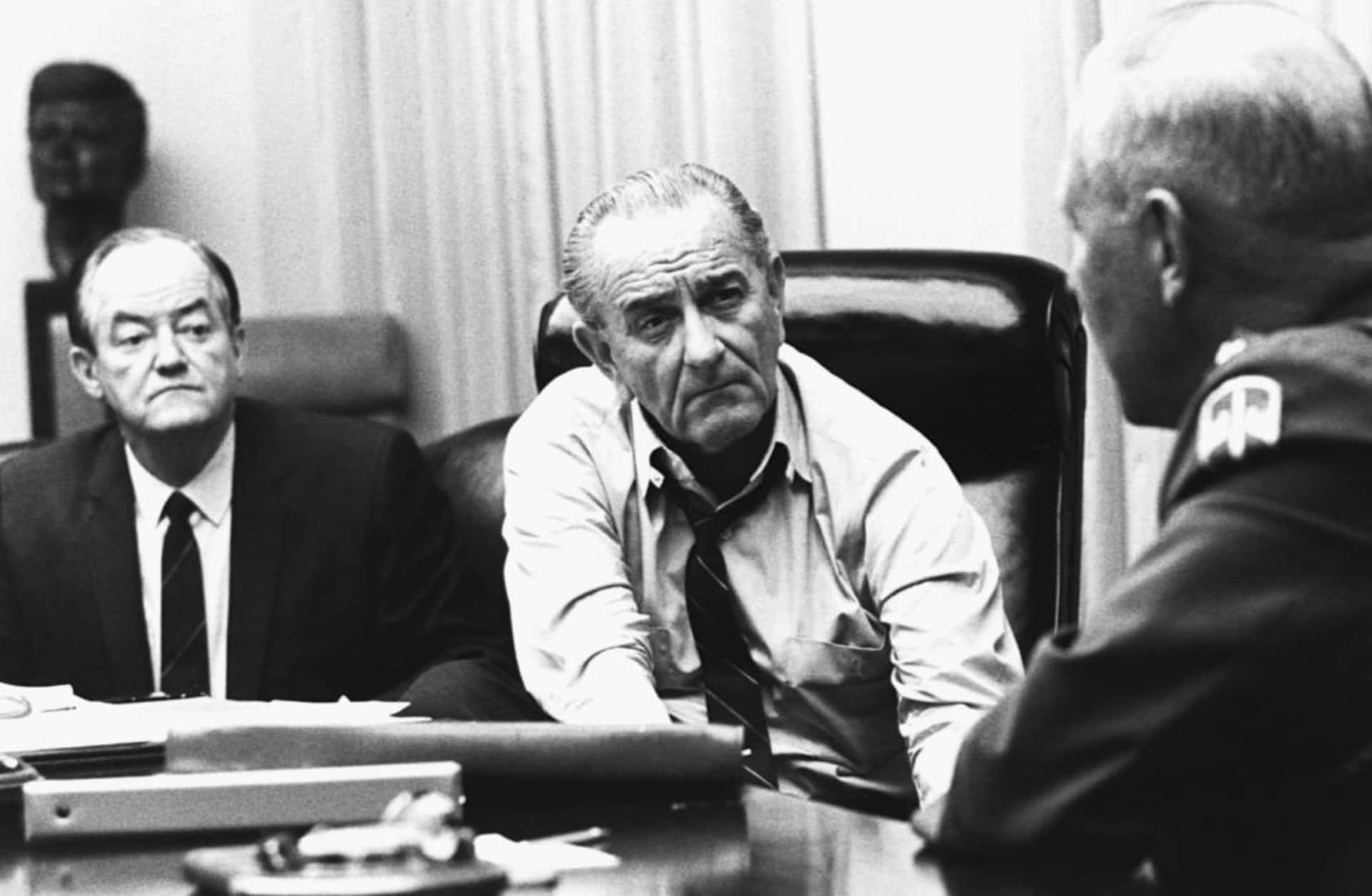 President Lyndon B. Johnson meets with General Creighton Abrams to discuss the partial halt to bombings in North Vietnam in March, 1968. Corbis/Getty Images