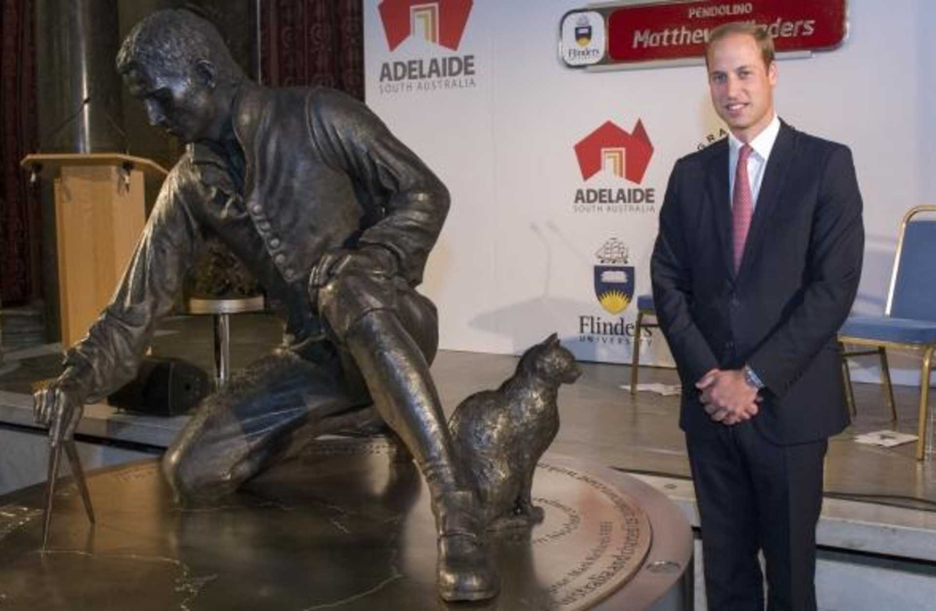 Prince William, Duke of Cambridge unveils a statue in honor of Captain Matthew Flinders. (Credit: Arthur Edwards/Getty Images)