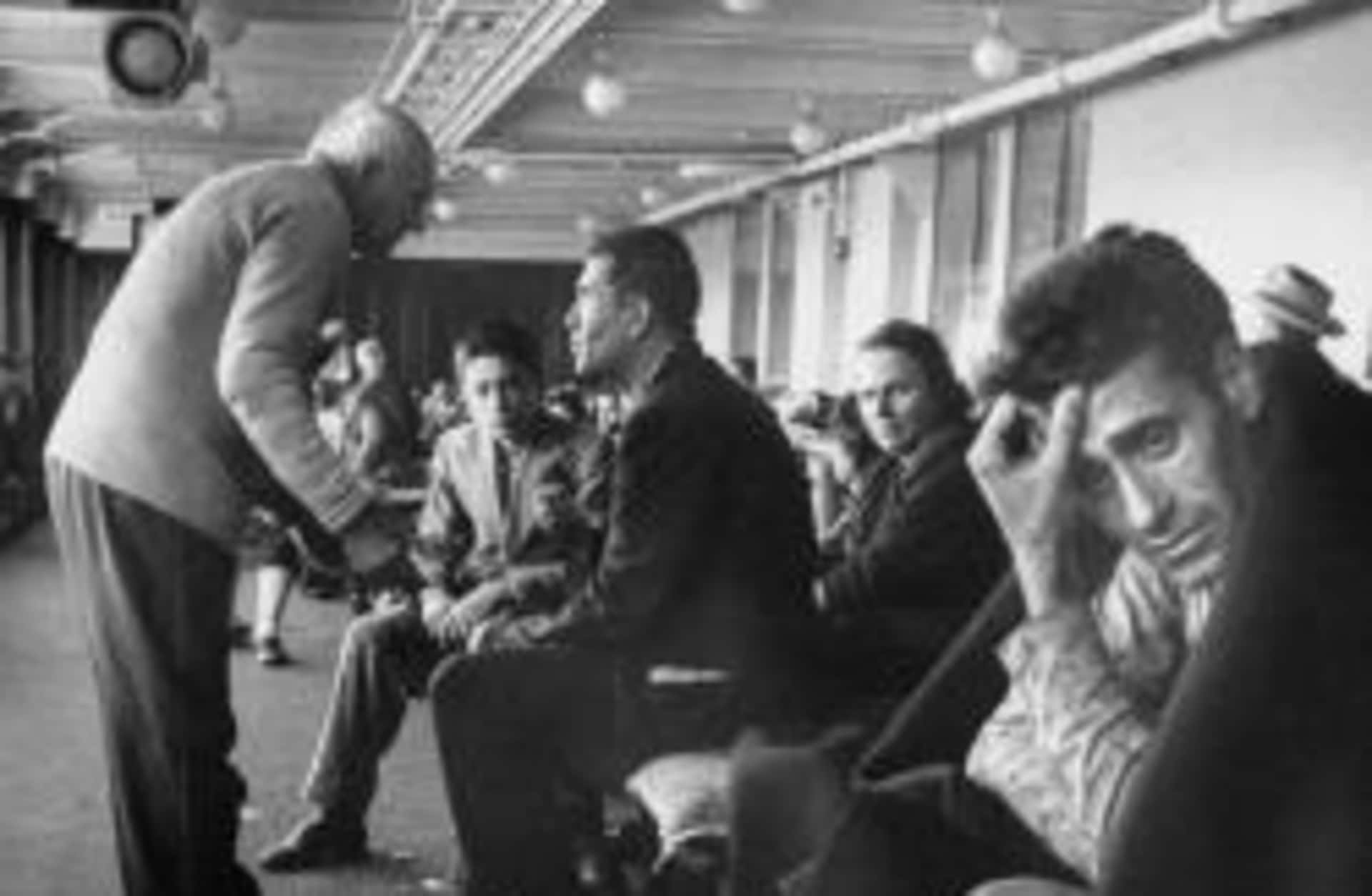Promenade deck of French Liner le de France occupied by survivors of Andrea Doria.  (Credit: Loomis Dean/The LIFE Picture Collection/Getty Images)
