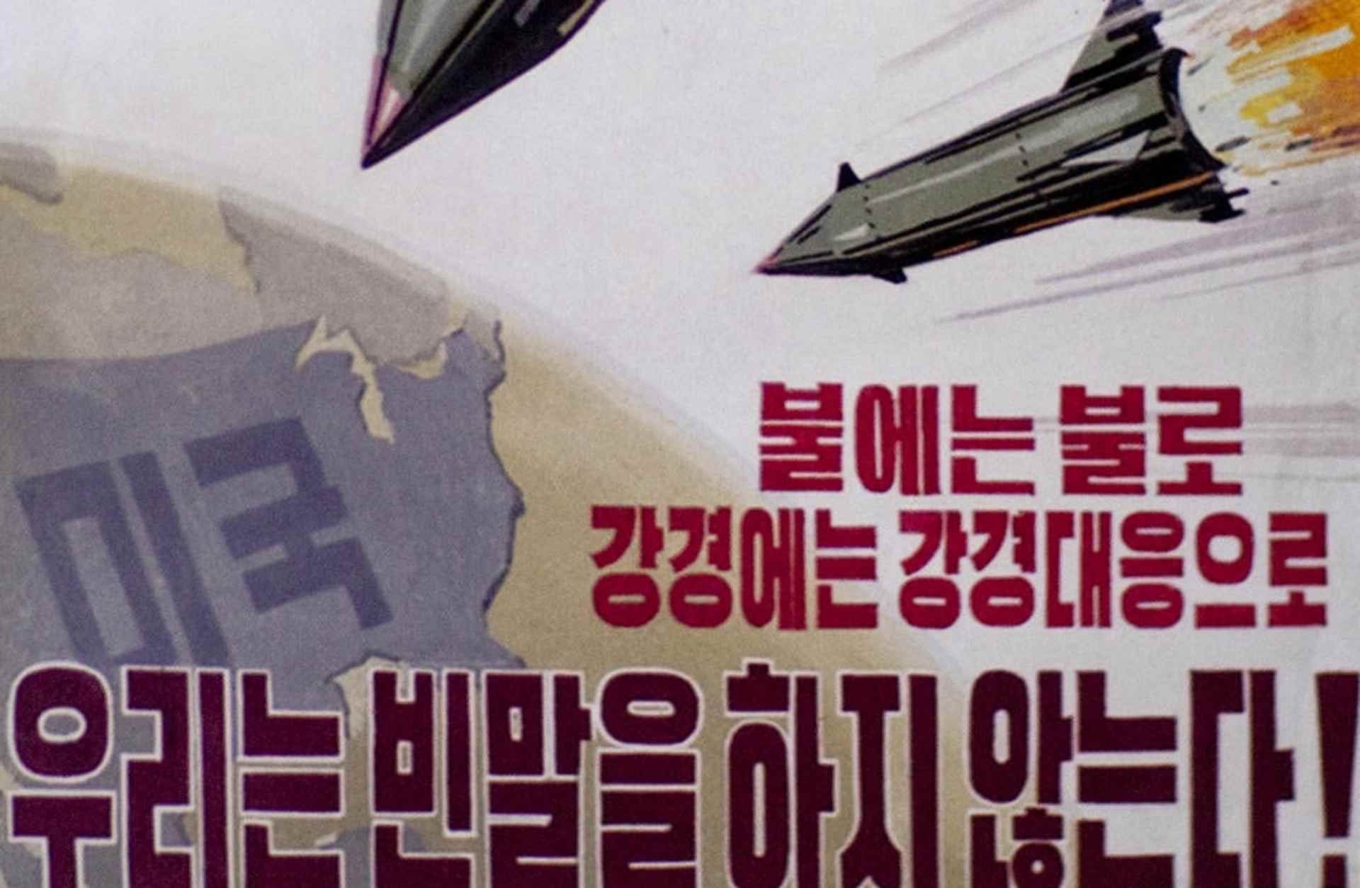  Propaganda poster, with missiles headed towards the U.S., seen in Pyongyang, North Korea, 2010. (Credit: Eric Lafforgue/Art In All Of Us/Corbis/Getty Images)