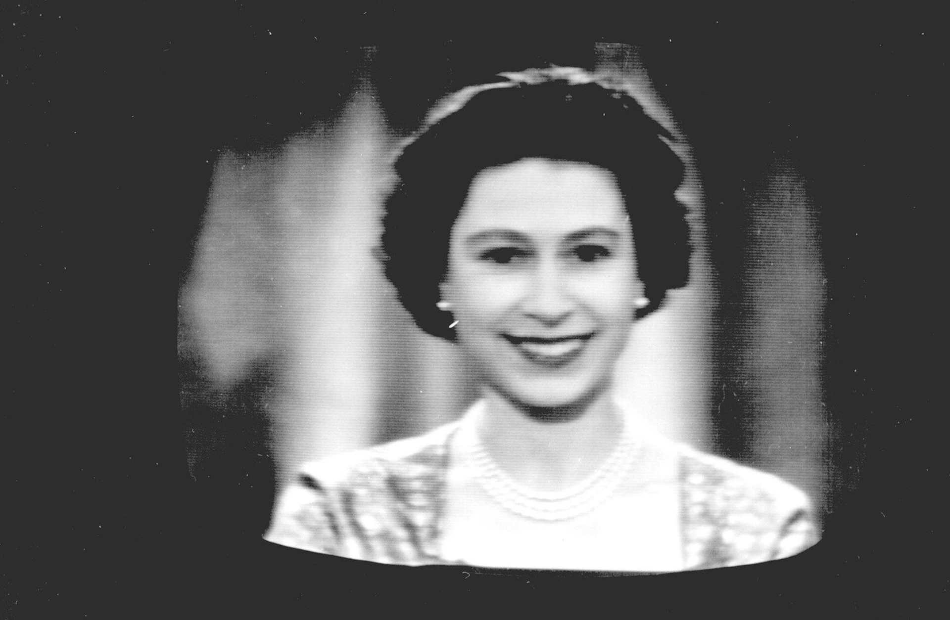 Queen Elizabeth ll delivers her Christmas speech at Buckingham Palace on December 25, 1957 in London, England.