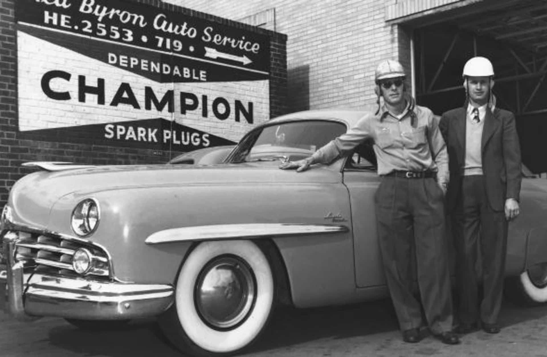 Red Byron (left) with his race car owner Raymond Parks in front of Byron's automotive garage, circa 1950s. (Credit: ISC Archives via Getty Images)
