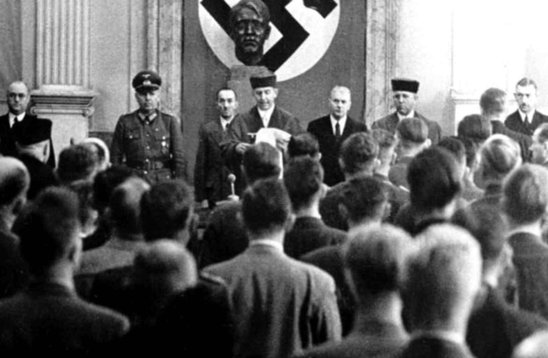 Roland Freisler, the President of the 'National Socialist People's Court' (Volksgerichtshof). Here he is reading out the verdict against the eight suspects of the assassination attempt on Hitler, the so-called July Plot, at the court in Berlin, 1944. (Credit: DPA/Picture-Alliance/AP Images)