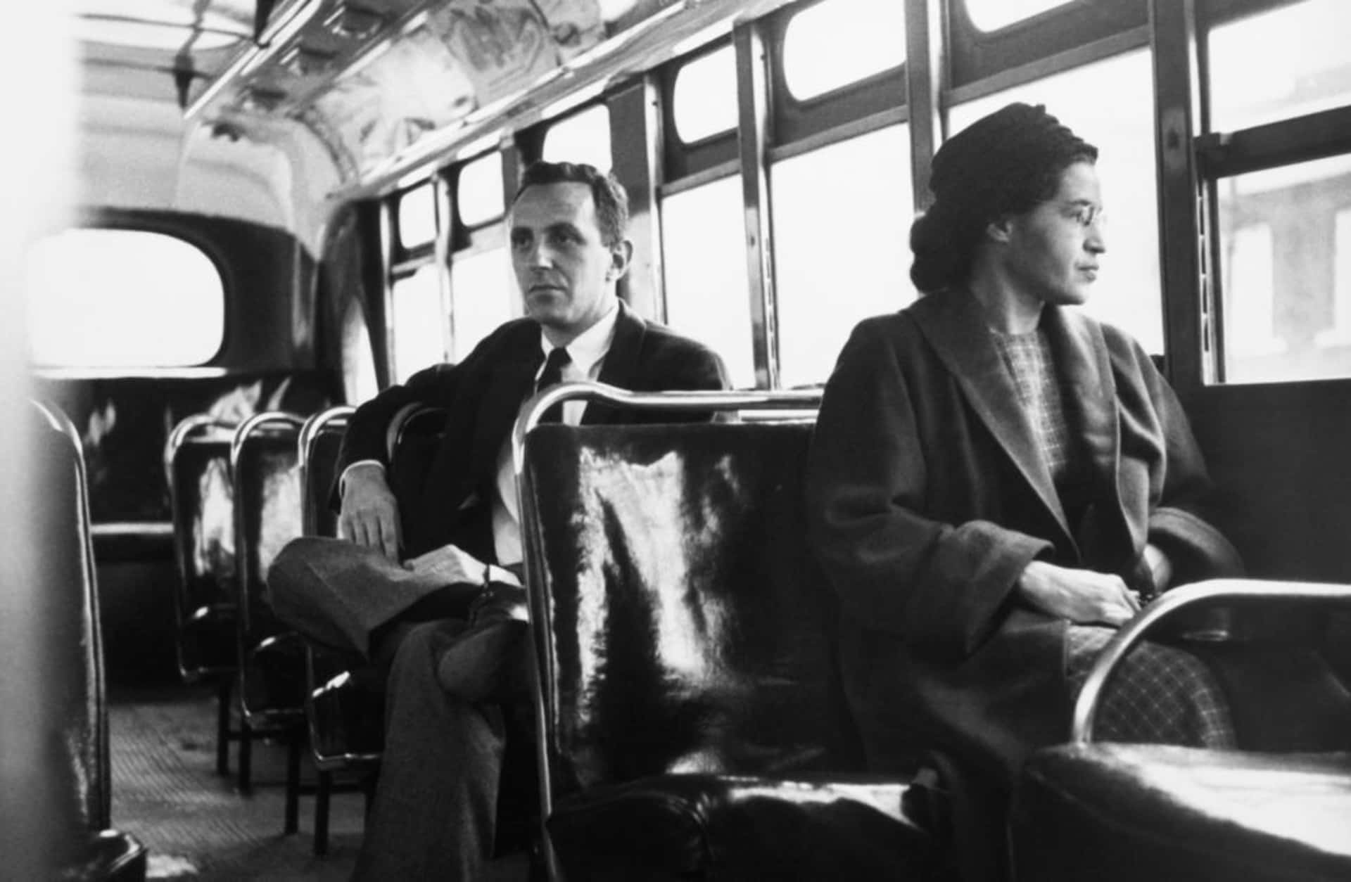 Rosa Parks sitting in the front of a bus in Montgomery, Alabama, after the Supreme Court ruled segregation illegal on the city bus system on December 21st, 1956. (Credit: Bettmann Archive/Getty Images)