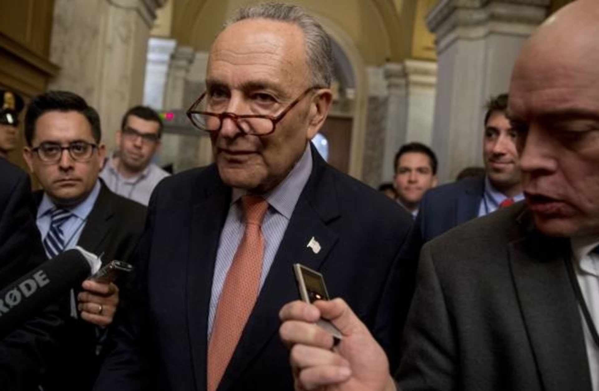 Senator Chuck Schumer of New York speaking with reporters as he leaves Capitol Hill in Washington, just after Trump tweeted that the driver in the October 31, 2017 New York attack "came into our country through what is called the 'Diversity Visa Lottery Program,' a Chuck Schumer beauty". (Credit: AP/REX/Shutterstock)
