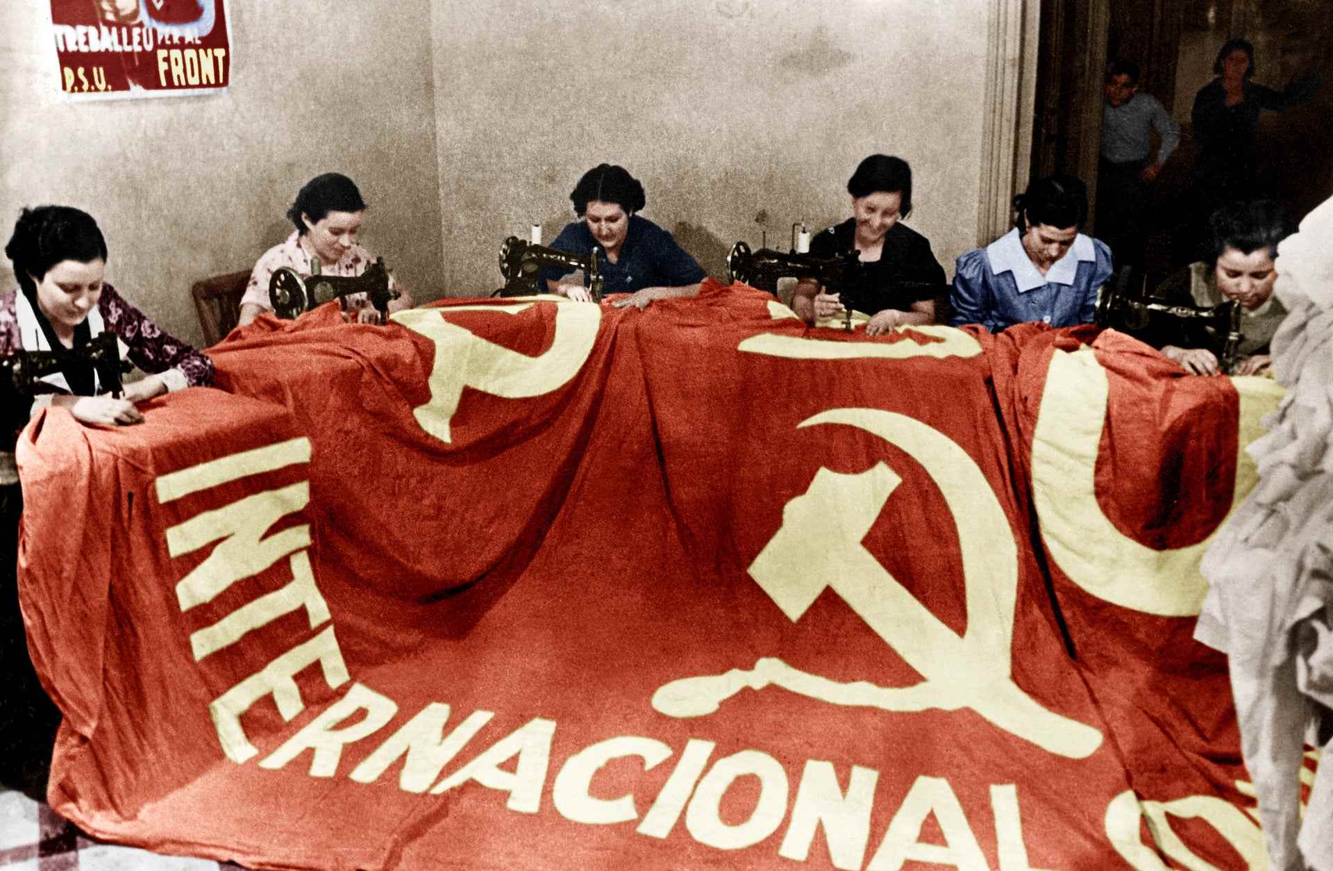 Making of a flag for the International Communist Brigade during the Spanish Civil War, 1936.