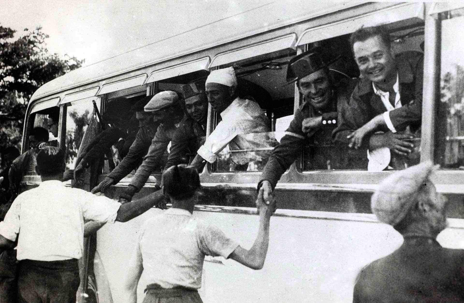 A coach load of volunteers leaving Madrid to fight for the government against the rebels to the north of the capital, 1936.