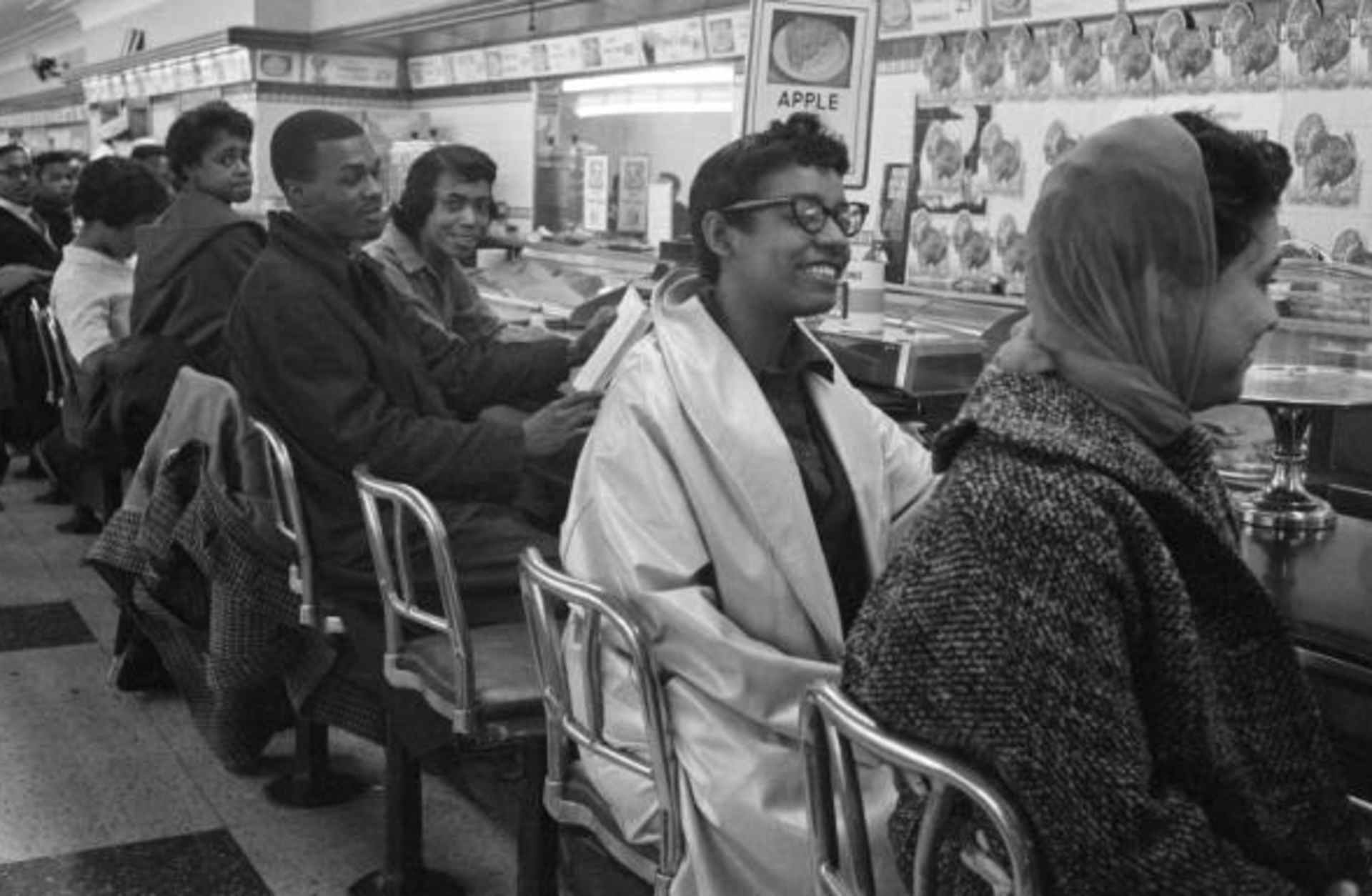 Students line the counter in protest for the stores refusal to serve them.