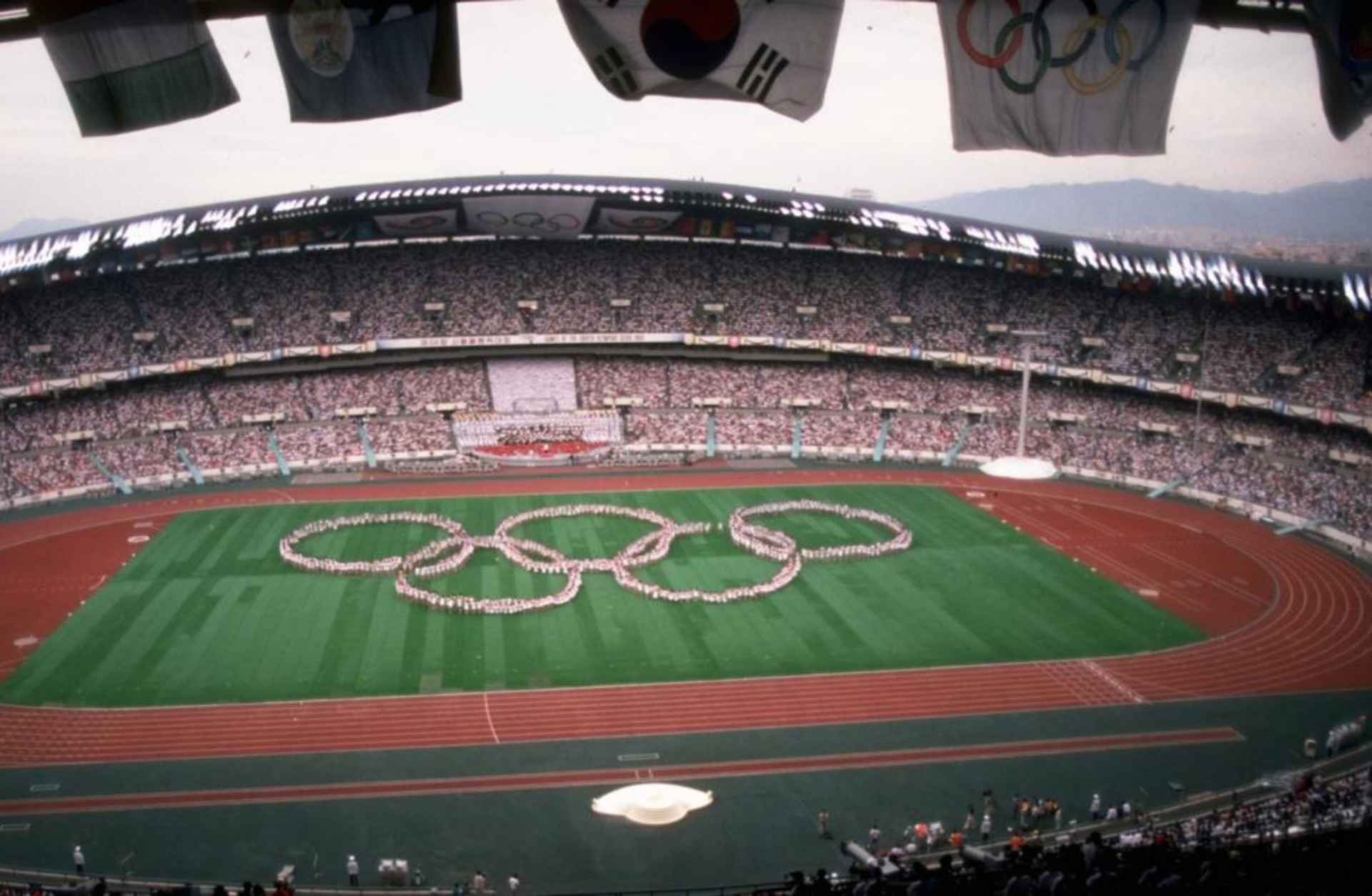 The Olympic Stadium during a dress rehearsal for the Opening Ceremony of the 1988 Olympic Games in Seoul, South Korea. (Credit: Gray  Mortimore/Allsport/Getty Images)