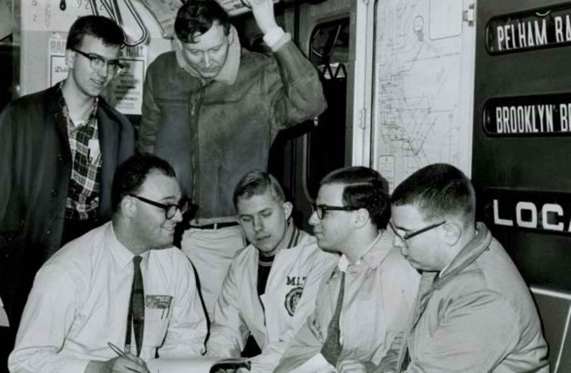 The team, with Peter Samson standing in the center