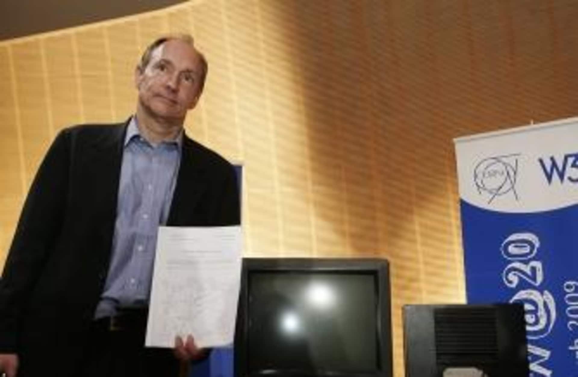 Tim Berners-Lee, Inventor of the Web, poses in front of the first World Wide Web Server. (Credit: SEBASTIAN DERUNGS/AFP/Getty Images)