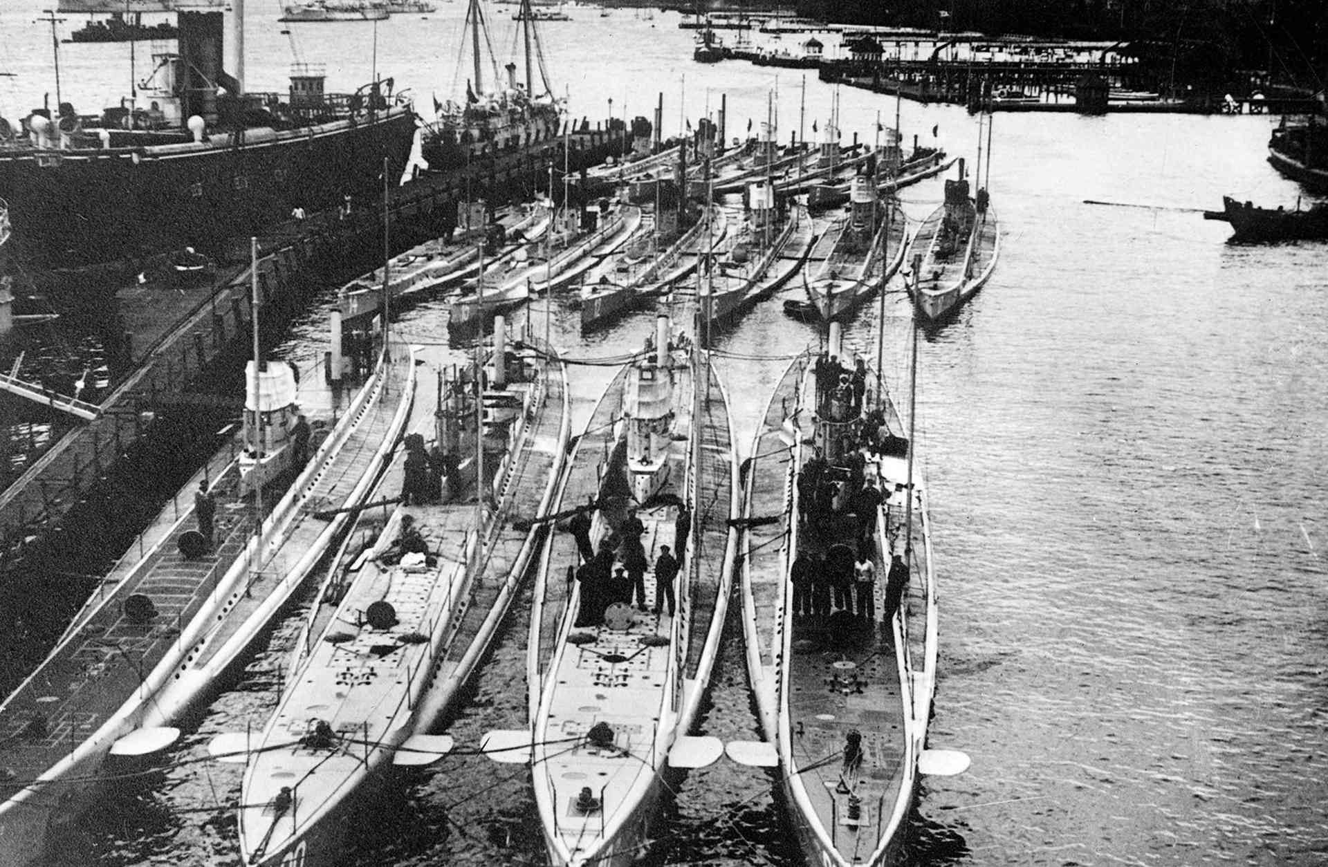 German submarines parked in harbor, circa 1914. Front row (left to right): U-22, U-20 (sank the Lusitania), U-19 and U-21. Back row (left to right): U-14, U-10 and U-12.