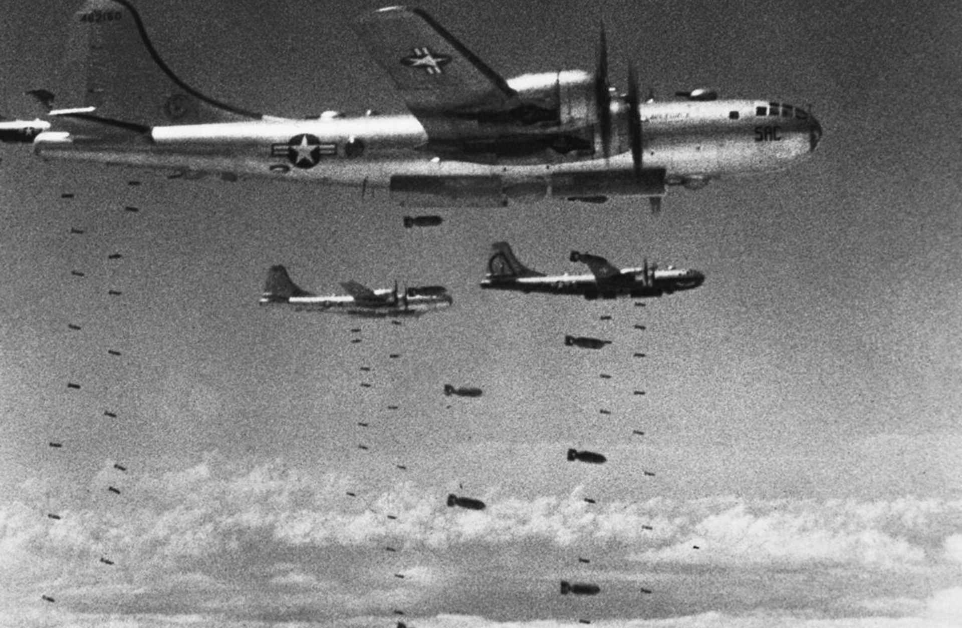 U.S. B-29's dropping bomb loads on North Korean targets during the Korean War. (Credit: Hulton-Deutsch Collection/Corbis/Getty Images)