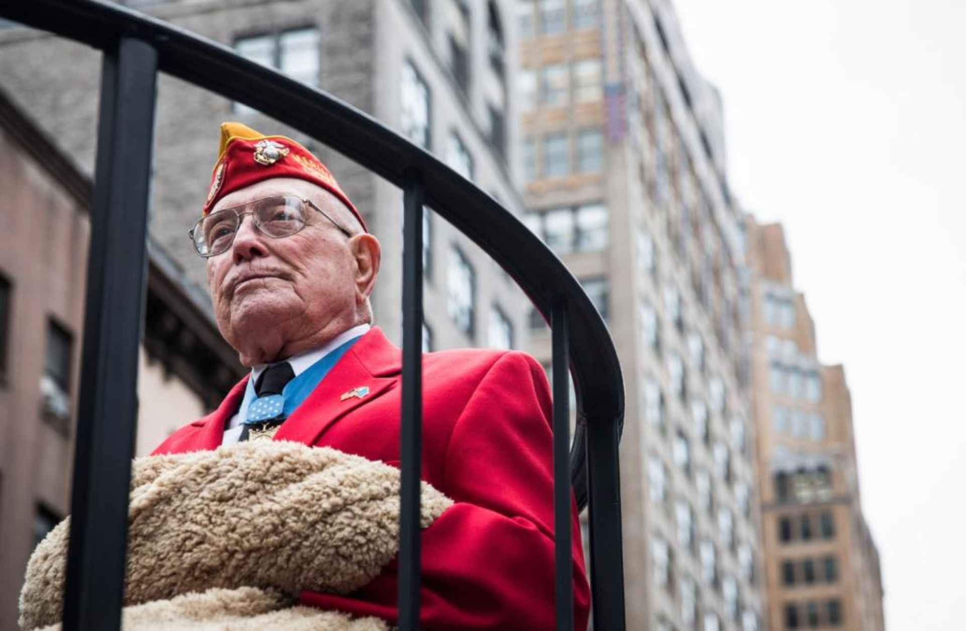 United States Marine Hershel "Woody" Williams riding on a float during the Veteran's Day Parade in New York City, 2013. (Credit:  Andrew Burton/Getty Images)
