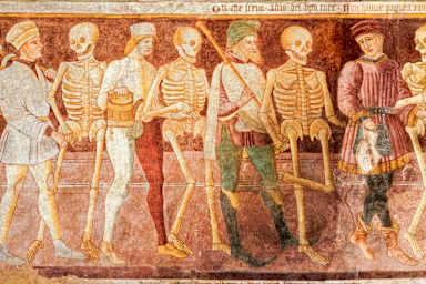 An ancient fresco of the Danza Macabra (Dance of the Death) and Trionfo della Morte (Triumph of the Death)