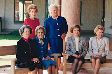 Portrait of former US First Ladies, seated from left, Lady Bird Johnson, Pat Nixon, Rosalynn Carter, and Betty Ford and, standing from left, Nancy Reagan and First Lady Barbara Bush, as they pose together at the opening of the Ronald Reagan Library, Simi Valley, California, November 4, 1991.