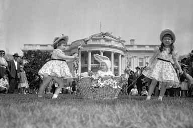 Three sisters at the Traditional Easter Egg Roll on the White House lawn. President Eisenhower hosted the event, which first started in 1878.