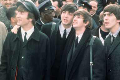 The Beatles arrive at New York's JFK airport on February 7, 1964.