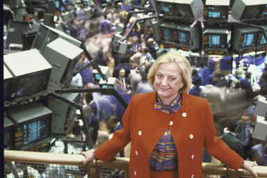 Muriel Siebert, first female head of a brokerage firm, above the floor of the NY Stock Exchange.