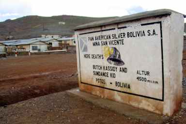 A worn, gramatically flawed marker welcomes visitors to San Vicente, Bolivia, the final resting place of Butch Cassidy and the Sundance Kid. (Photo by Tyler Bridges/Miami Herald/Tribune News Service via Getty Images)