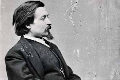 Seated portrait of cartoonist Thomas Nast. Photo by Matthew Brady.