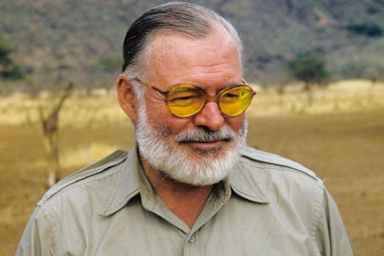 Author Ernest Hemingway poses for a portrait while on a big game hunt in September 1952 in Kenya.