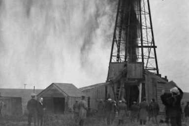 Workers strike oil in Osage territory. (Credit: David Grann)