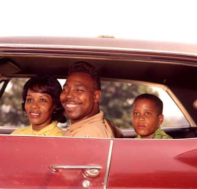 An African American family on the move during the latter half of the Great Migration, circa the 1960s.